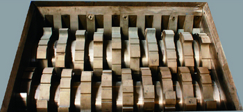 Integral blades of double shaft shredder